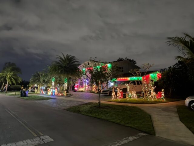 Decorated houses with lights along a South Creek street